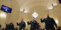 WASHINGTON, DC - JULY 27: (L-R) U.S. Capitol Police officer Sgt. Aquilino Gonell, DC Metropolitan Police Department officer Michael Fanone, DC Metropolitan Police Department officer Daniel Hodges and U.S. Capitol Police officer Harry Dunn are sworn in prior to testifying before the House Select Committee investigating the January 6 attack on the U.S. Capitol on July 27, 2021 at the Cannon House Office Building in Washington, DC. Members of law enforcement testified about the attack by supporters of former President Donald Trump on the U.S. Capitol. According to authorities, about 140 police officers were injured when they were trampled, had objects thrown at them, and sprayed with chemical irritants during the insurrection. (Photo by Chip Somodevilla/Getty Images)