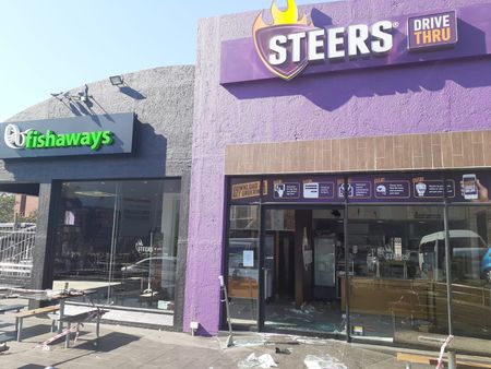 Hope and goodwill continue to float as grassroots project - to rebuild after looting - takes shape