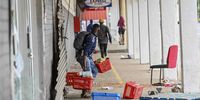 Most reports say that the majority of people looting went to get food. (Photo: Gallo Images / Volksblad / Mlungisi Louw)