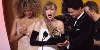 Taylor Swift accepts the "Best Pop Vocal Album" award for "Midnights" from Trevor Noahonstage during the 66th GRAMMY Awards at Crypto.com Arena on February 04, 2024 in Los Angeles, California. (Photo by Amy Sussman/Getty Images)