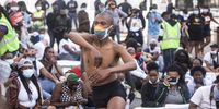 CAPE TOWN, SOUTH AFRICA - APRIL 26: Protesters outside Parliament during the End Queer and Trans Hate Campaign on April 26, 2021 in Cape Town, South Africa. The march was in solidarity with the African LGBTQI+ victims and survivors of violence. (Photo by Gallo Images/Brenton Geach)