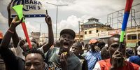 People celebrate and demonstrate in anticipation of election results on 15 August in Kisumu, Kenya. (Photo: Ed Ram / Getty Images)