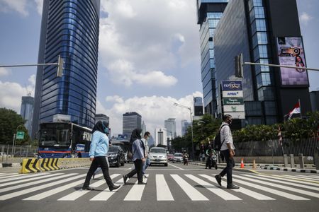 Mutated coronavirus strain found in Indonesia as cases jump