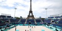 A general view as Team France and Team Austria compete during a Beach Volleyball training session on Day-1 of the Olympic Games Paris 2024 at the Eiffel Tower Stadium on July 25, 2024 in Paris, France. Many of the Olympic events, such as beach volleyball, will be played outside in the heat. (Photo by Michael Reaves/Getty Images)