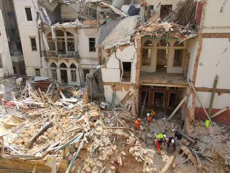 Rescuers sift Beirut rubble amid signs of life a month after blast