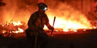A firefighter battles the Park Fire, which has currently burned over 353,194 acres according to the California Department of Forestry and Fire Protection (Cal Fire), in Tehama County, California, USA, 28 July 2024. According to a press release from Butte County District Attorney Mike Ramsey, a 42-year-old man from Chico, California was arrested for allegedly pushing a burning car into a gully which set off the Park Fire. As of today, according to Cal Fire, the fire was 12 percent contained.  EPA-EFE/JOHN G. MABANGLO