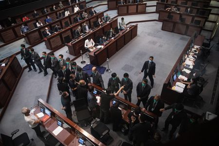 Hong Kong passes China national anthem bill amid protests by democracy lawmakers