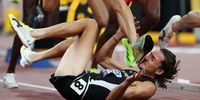 Geordie Beamish of Team New Zealand avoids the foot of Jean-Simon Desgagnes of Team Canada as he falls to the ground during the the Men's 3000 Metres Steeplechase Heats on day one of the World Athletics Championships Tokyo 2025 at National Stadium on September 13, 2025 in Tokyo, Japan.  (Photo by Emilee Chinn/Getty Images)
