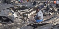 A general view of the aftermath after a fire destroyed thousands of shacks in Masiphumelele on December 18, 2020 in Cape Town, South Africa. According to media reports no one was injured or killed in the disaster and the cause of the fire is still investigated. (Photo: Gallo Images/Brenton Geach)