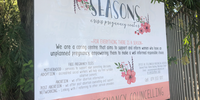 The sign outside the Seasons