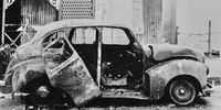 Burnt out remains of sister Aiden’s car in which she was murdered,after a mob attack during protests in Duncan Village.Photo:© Supplied