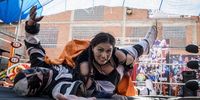 The fighting cholitas perform a wrestling show in El Alto, Bolivia, 14 January 2024 (issued 15 January 2024). Shows are presented every Sunday evening with female wrestlers wearing colorful skirts and even fighting male wrestlers. Mariposa Misteriosa, Mercedes la Xtremista, Gloria, and Susana La Bonita are the prominent wrestlers in this ring.  EPA-EFE/ESTEBAN BIBA -FOTOGALERÍA-
