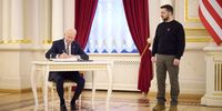 KYIV, UKRAINE - FEBRUARY 20: In this handout photo issued by the Ukrainian Presidential Press Office, U.S. President Joe Biden signs the guest book during a meeting with Ukrainian President Volodymyr Zelensky at the Ukrainian presidential palace on February 20, 2023 in Kyiv, Ukraine. The US President made his first visit to Kyiv since Russia's large-scale invasion last February 24. (Photo by Ukrainian Presidential Press Office via Getty Images)