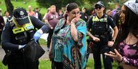 A woman is searched by Victoria Police officers at a 420 Rally and Community Picnic 2023 in Melbourne, Australia, 20 April 2023. The annual  '420 or 4/20' is known in cannabis culture as Cannabis Day or Weed Day and has become an international counterculture holiday based on the celebration and consumption of cannabis with events advocating for cannabis legalisation.  EPA-EFE/JAMES ROSS  AUSTRALIA AND NEW ZEALAND OUT