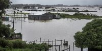 Flooded homes on 25 September 2023 in Sandvlei, Western Cape. (Photo: Benton Geach / Gallo Images)