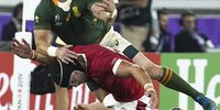 epa07952920 Faf de Klerk (up) of South Africa in action against Leigh Halfpenny (bottom) of Wales during the Rugby World Cup 2019 semi final match between South Africa and Wales at the International Stadium Yokohama in Yokohama City, Japan, 27 October 2019.  EPA-EFE/FRANCK ROBICHON EDITORIAL USE ONLY/ NO COMMERCIAL SALES / NOT USED IN ASSOCIATION WITH ANY COMMERCIAL ENTITY