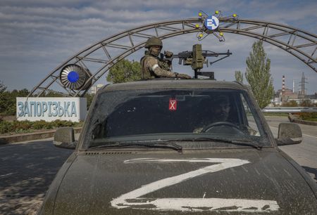Russia destroys bridge over Ukrainian river, cutting escape route