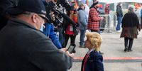 ERIE, PA - OCTOBER 20:  Geno Benford, 7, of Johnstown, Pennsylvania, traveled three hours with his family to join other supporters of U.S. President Donald Trump at North Coast Air aeronautical services at Erie International Airport on October 20, 2020 in Erie, Pennsylvania. Trump is holding the rally two days ahead of the final presidential debate.  (Photo by Jeff Swensen/Getty Images)