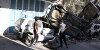 Palestinian youth inspect destoyed cars after an Israeli raid in the Balata refugee camp, near Nablus, West Bank 15 August 2024. At least two Palestinians were killed and ten others injured in an Israeli airstrike in the Balata refugee camp, according to the Palestinian Health Ministry.  EPA-EFE/ALAA BADARNEH
