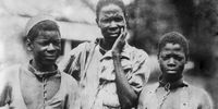 Circa 1910: Three Abyssinian slaves in iron collars and chains.  (Photo: Hulton Archive / Getty Images)