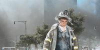 An unidentified New York City firefighter walks away from Ground Zero after the collapse of the Twin Towers September 11, 2001 in New York City. The World Trade Center's Twin Towers and the Pentagon were attacked by terrorists using commercial airliners as missiles.  (Photo by Anthony Correia/Getty Images)