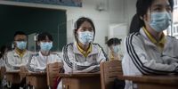 WUHAN, CHINA - MAY 06: (CHINA OUT) Senior students study in a classroom with transparent boards placed on each desk to separate each other as a precautionary measure against the spread of COVID-19 at Wuhan No. 23 Middle School on May 6, 2020 in Wuhan, Hubei Province, China .About 57,800 students in their final year from 121 high and vocational schools returned to campus on Wednesday in Wuhan, The city previously hard hit by the COVID-19 outbreak.(Photo by Getty Images)