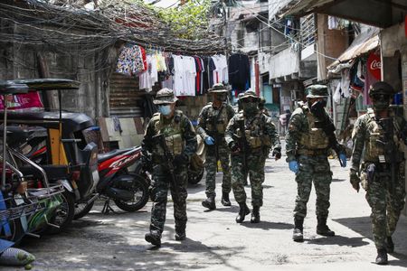 Philippines to use police in house-to-house searches for Covid-19 cases