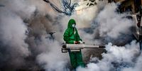 MANILA, PHILIPPINES - MARCH 26: A worker wearing a hazmat suit uses a fogging machine to disinfect a street as preventive measure against COVID-19 on March 26, 2021 in Manila, Philippines. Curfews and stricter lockdowns are being implemented in several areas across the Philippines as the country experiences its worst surge in cases since the lockdown began more than a year ago. The country has reported more than 693,000 cases of COVID-19 so far, with at least 13,095 deaths. (Photo by Ezra Acayan/Getty Images)