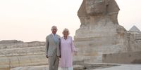 Prince Charles, Prince of Wales and Camilla, Duchess of Cornwall during a visit to the Great Pyramids of Giza and the Great Sphinx of Giza, on the third day of their tour of the Middle East on 18 November 2021 in Cairo, Egypt. (Photo: Joe Giddens - Pool/Getty Images)