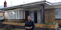 Gloria Gqabaza outside her house in Orange Grove, Johannesburg. (Photo: Michelle Banda)