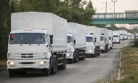 Ukraine accuses Russia of cynicism over convoy; death toll rises sharply