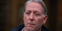 Charles McGonigal, the former head of counterintelligence for the FBI’s New York office, listens to his attorney Seth Ducharme give a statement to the media after leaving Manhattan Federal Court on 23 January 2023 in New York City. McGonigal is being charged with money laundering and conspiring to violate US sanctions against Russia while secretly working with Russian oligarch Oleg Deripaska. Sergey Shestakov, a former Soviet and Russian diplomat, has also been charged in the case.  (Photo: Michael M Santiago / Getty Images)