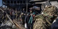 IRPIN, UKRAINE - MARCH 10: Residents of Irpin and Bucha flee fighting via a destroyed bridge on March 10, 2022 in Irpin, Ukraine. Irpin, a suburb northwest of Kyiv, had experienced days of sustained shelling by Russian forces advancing toward the capital. Well over two million people have fled Ukraine since Russia launched its attack on February 24. (Photo by Chris McGrath/Getty Images)