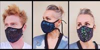 Rufftung design duo modeling their sequined masks. Image via rufftung.co.za
