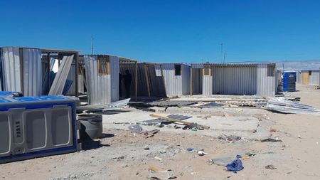 Sewerage maintenance, relocation of Khayelitsha families delayed after vandalism of temporary housing