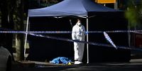 Forensic Police work at the scene of a shooting in Canterbury, Sydney, Australia 27 July 2023. A man has been shot dead in Sydney’s southwest, just hours after a high-profile criminal lawyer was shot and injured in the driveway of his home.  EPA-EFE/DAN HIMBRECHTS 