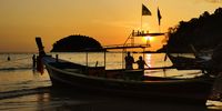 Sunset off Kata Beach, Phuket, Thailand. 20 February 2023. Photographer: Douglas Couperthwaite