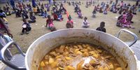 This 100-litre pot of curry  is a lifeline for the adults and children who gather daily on The Battlefield in Lavender Hill to collect bakkies of food that are often the only nutrition they will get as the lockdown hunger crisis deepens. (Photo: Brenton Geach)