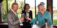 Britain's King Charles III (L) and his wife Queen Camilla (C) toast glasses during a visit to the sustainable vineyard Chateau Smith Haut Lafitte on the third day of the his State Visit to France, in Martillac, southwestern France, 22 September 2023. Britain's King Charles III and his wife Queen Camilla are on a three-day state visit starting on 20 September 2023, to Paris and Bordeaux, six months after rioting and strikes forced the last-minute postponement of his first state visit as king.  EPA-EFE/CHRISTOPHE ARCHAMBAULT / POOL