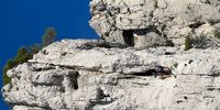 Plucky climbers giving the les Calanques rocky face a go at Cassis Marseille France. Photographer: Sarena Baxter