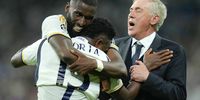 Antonio Rudiger of Real Madrid celebrates with team-mate Vinicius Junior and coach Carlo Ancelotti at Estadio Santiago Bernabeu. 8 May 2024. (Photo: Chris Brunskill/Fantasista/Getty Images)