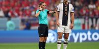 AL KHOR, QATAR - DECEMBER 01: Referee Stephanie Frappart looks on with Niclas Fuellkrug of Germany before awarding Germany their fourth goal after a VAR check during the FIFA World Cup Qatar 2022 Group E match between Costa Rica and Germany at Al Bayt Stadium on December 01, 2022 in Al Khor, Qatar. (Photo by Alexander Hassenstein/Getty Images)