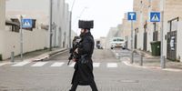 Asaf Peleg, a member of the Emergency squad class carries an assault rifle and a gun as he patrols the neighborhood in the city of Kiryat Malachi, Israel. 28 January 2024. Since the 07 October 2023 Hamas attacks, the Israel Defense Forces (IDF) has recruited more than 300,000 reservists soldiers, while over 260,000 new applications for weapons licenses have been submitted to the Ministry of Internal Security office, the minister of national security said. The events of October 2023 had a huge impact on Israeli citizens and their sense of personal security.  EPA-EFE/ABIR SULTAN  ATTENTION: This Image is part of a PHOTO SET