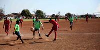 Young boys play soccer every Saturday on the dusty grounds of Naledi Club Columbia in Soweto. (Photo: Kabelo Mokoena)