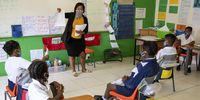 Lead Grade 4 teacher Matshepo Mokoena attends to her class at the Kgololo Academy in Alexandra, Gauteng. (Photo: Chris Collingridge)