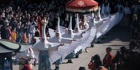 Dancers perform during the Shirasagi-no Mai, or White Heron Dance, at the Sensoji Temple on April 09, 2023 in Tokyo, Japan. The parade, which originated in the 8th-12th century in Kyoto,  was revived in 1968 to celebrate Tokyo's 100th Anniversary and to wish for peace. The dance is now held twice a year, in April and November, at the Sensoji Temple in Asakusa, one of Tokyo's most popular tourist destinations for foreign visitors.  (Photo by Tomohiro Ohsumi/Getty Images)
