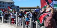 Hundreds of people march along the Sea Point Promenade in Cape Town on Sunday, 17 August, to protest against the targeted killings of journalists in Gaza. (Photo: Tamsin Metelerkamp)