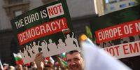 epa12154780 People attend a protest against the adoption of the euro in front of the National Bank in Sofia, Bulgaria, 04 June 2025. Bulgaria has fulfilled all the criteria and is ready to adopt the single European currency from 01 January 2026. This is clear from the convergence report of the European Commission (EC) published today.  EPA-EFE/VASSIL DONEV