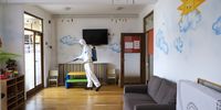 An official sprays disinfectant in a kindergarten to prevent the spread of the novel coronavirus in Miercurea Ciuc, or Csikszereda in Hungarian, central Romania, 11 March 2020. The Romanian National Emergency Committee has ordered the nationwide closure of every pre-school and educational institution between 11 and 22 March to allow ample time for the thorough disinfection of such facilities, against Covid-19, during this period. (Photo: EPA-EFE/NANDOR VERES HUNGARY OUT)