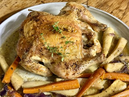 Chicken roasted with parsnips, carrots and thyme